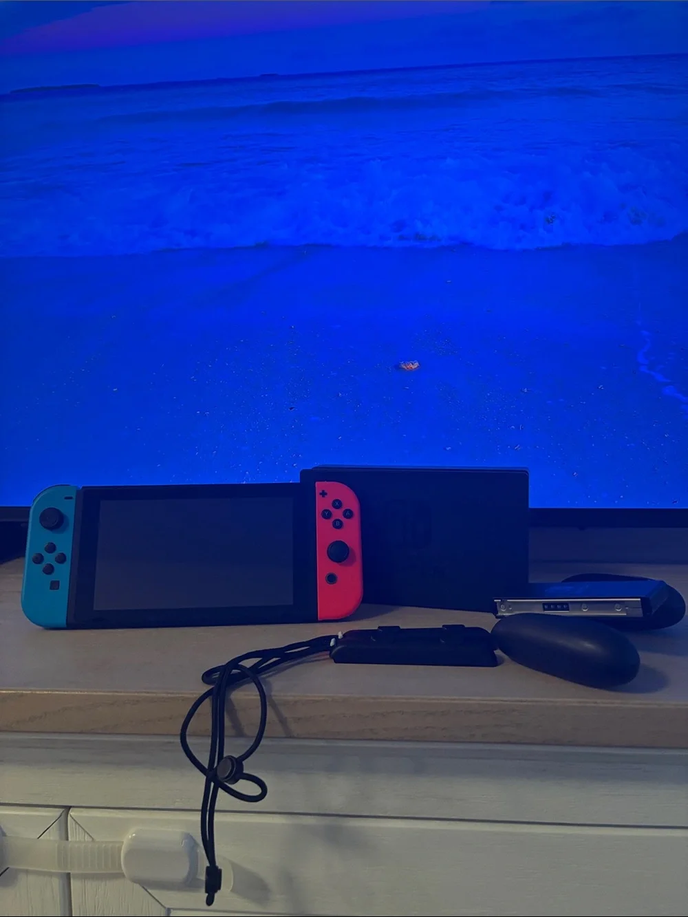 Nintendo Switch with Neon Red and Neon Blue Joy-Con